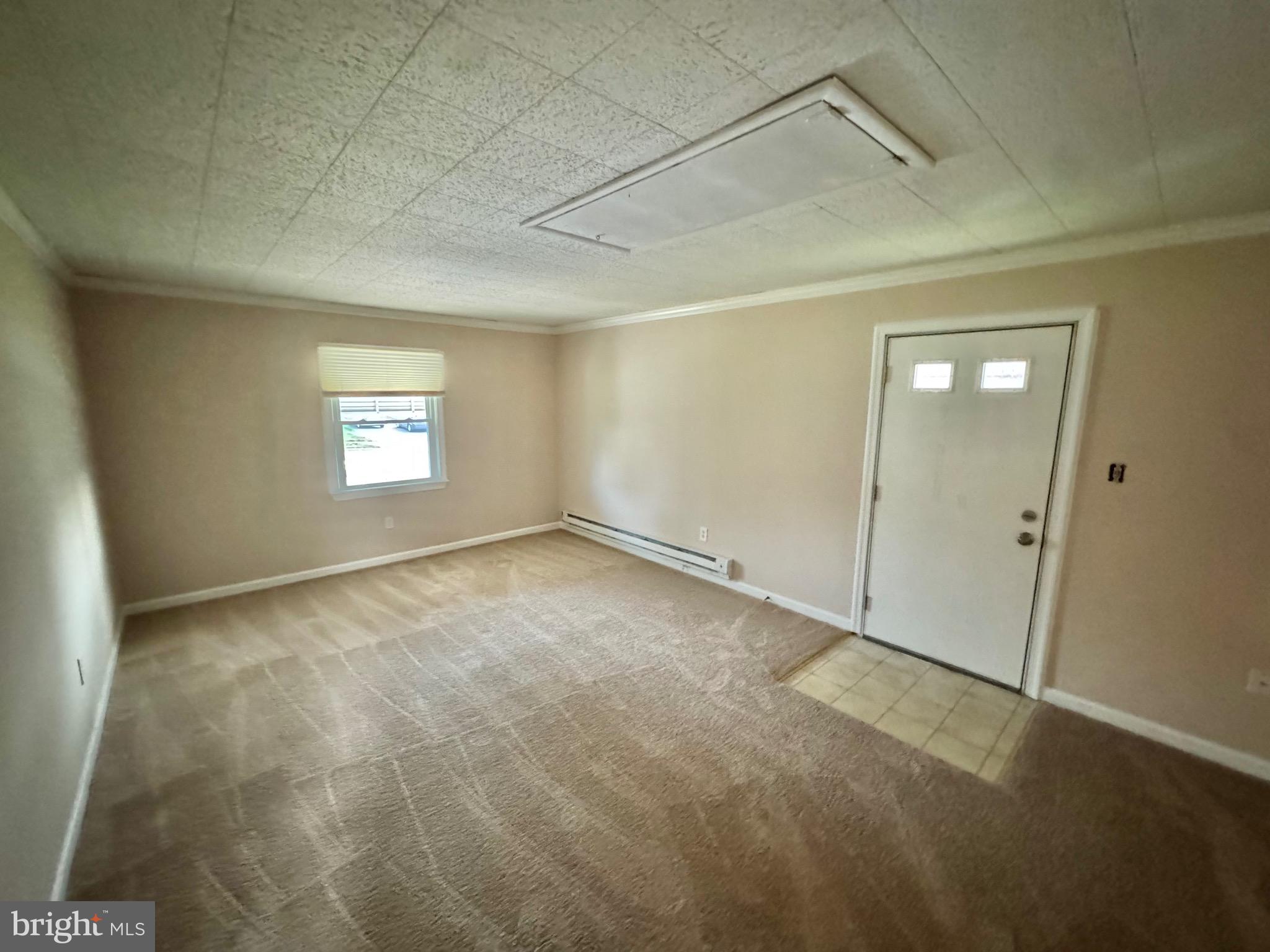 15758 Pointer Ridge Drive Bowie, MD 20716 - Photo 12 of 26 a view of an empty room and window