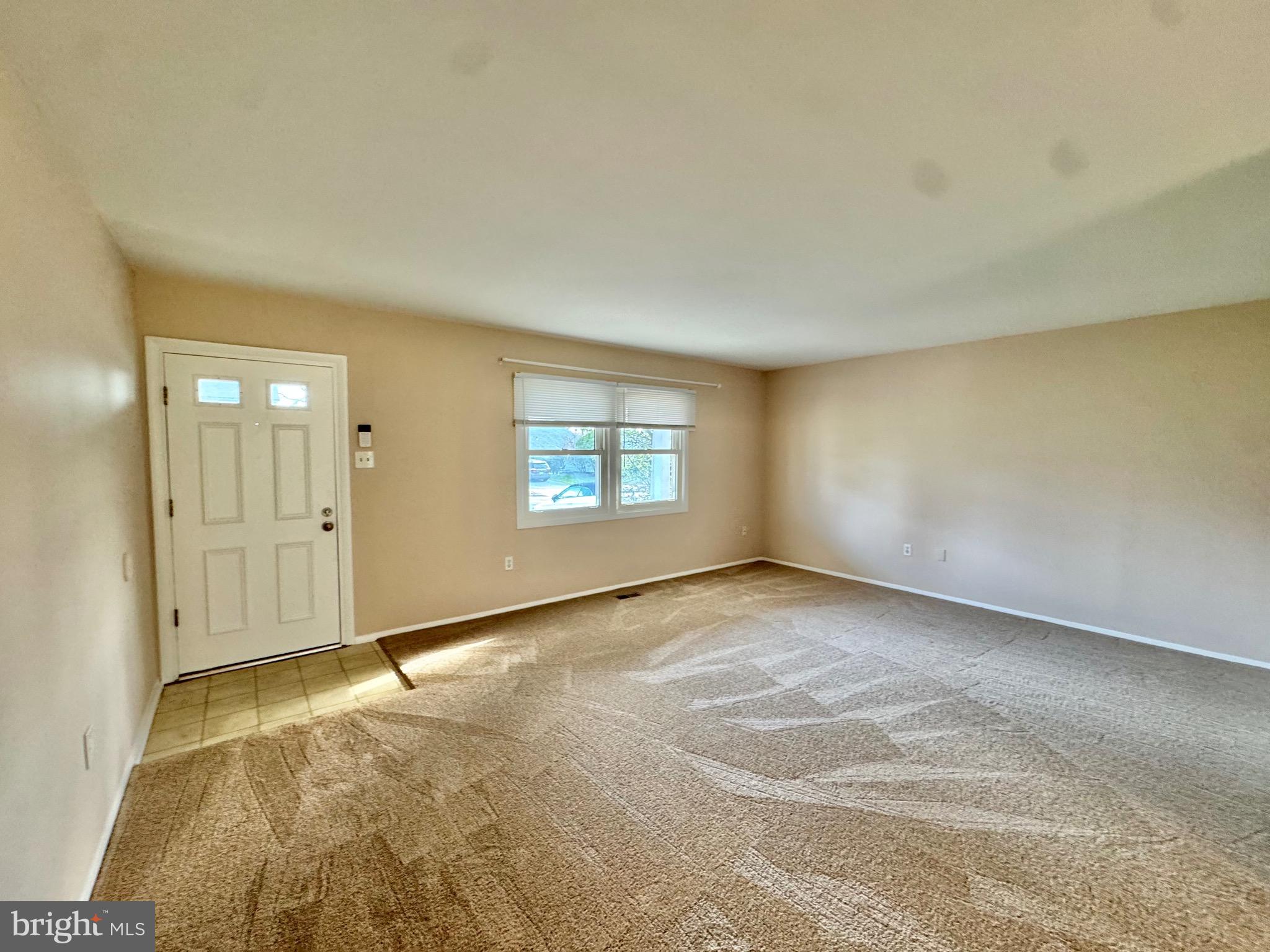 15758 Pointer Ridge Drive Bowie, MD 20716 - Photo 2 of 25 FOYER ENTRACE TO LIVING ROOM