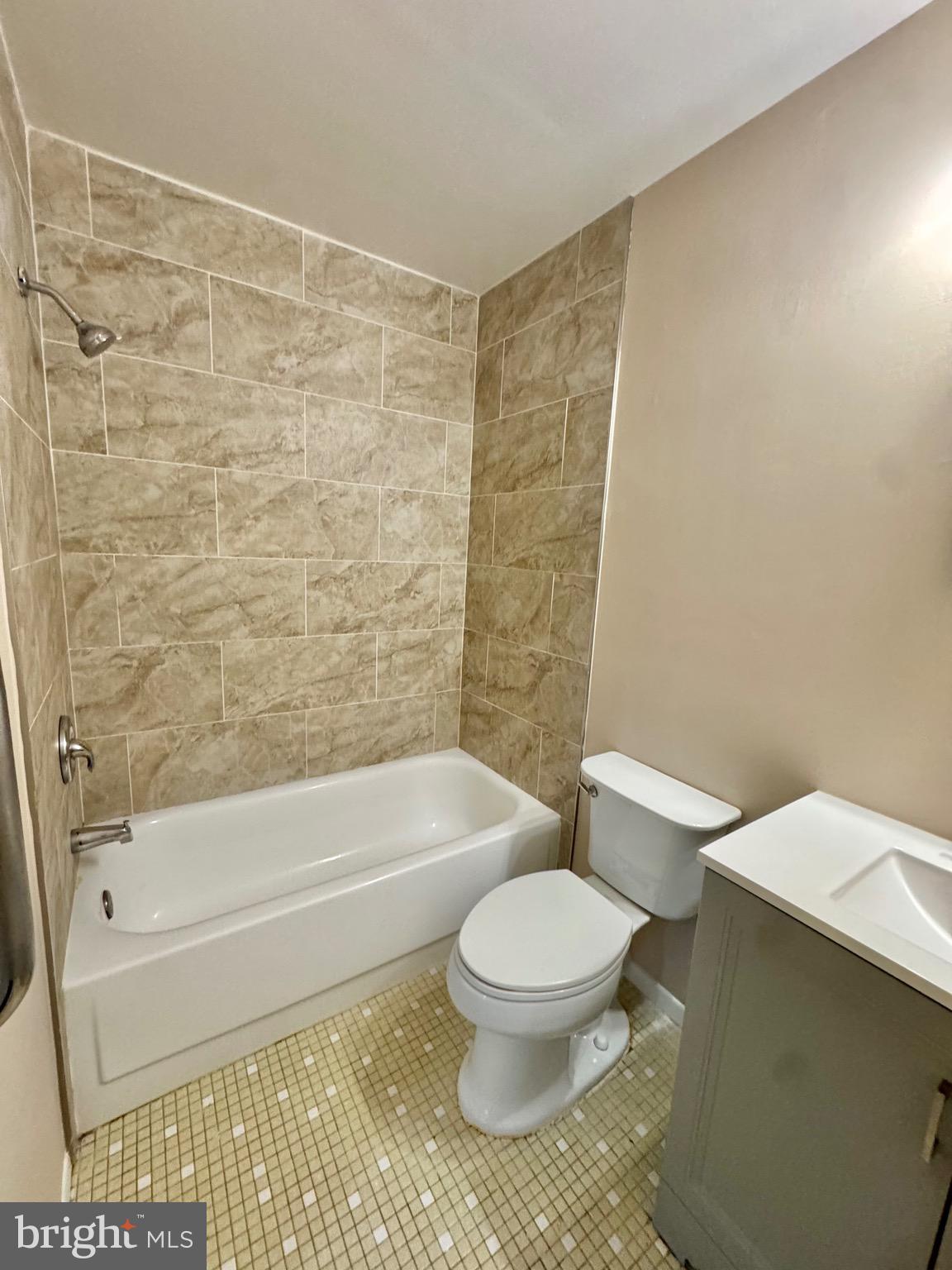 15758 Pointer Ridge Drive Bowie, MD 20716 - Photo 22 of 26 a bathroom with a toilet and a shower