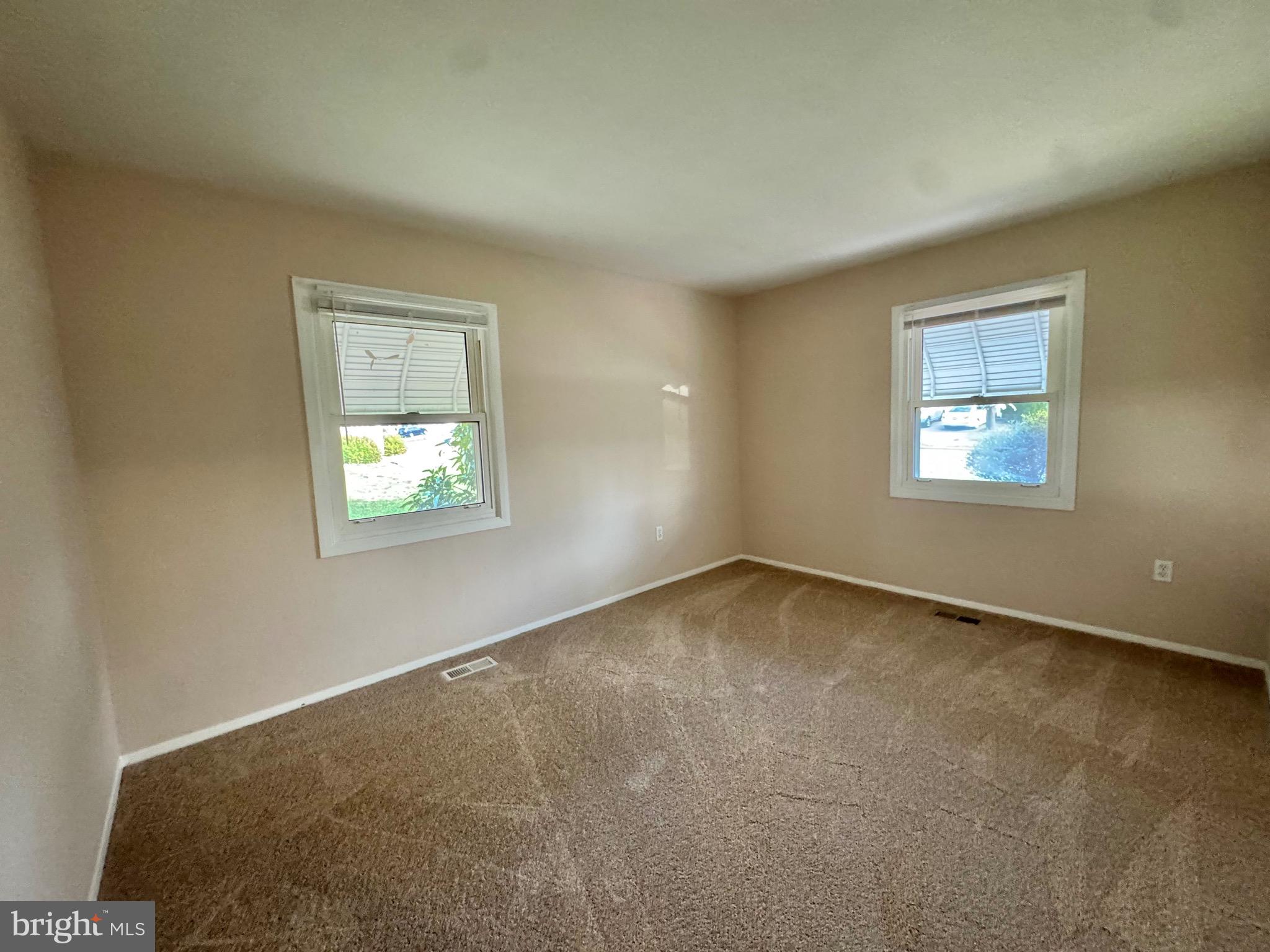 15758 Pointer Ridge Drive Bowie, MD 20716 - Photo 24 of 26 an empty room with a window