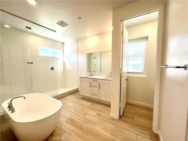 a bathroom with a sink and a bathtub