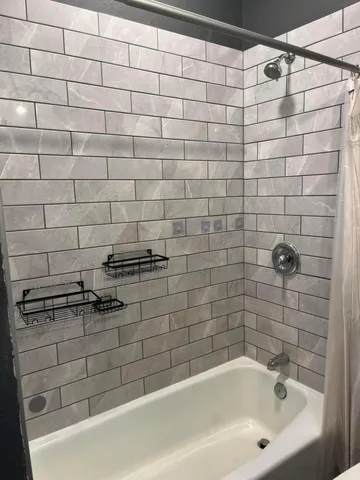 a bathroom with a bathtub