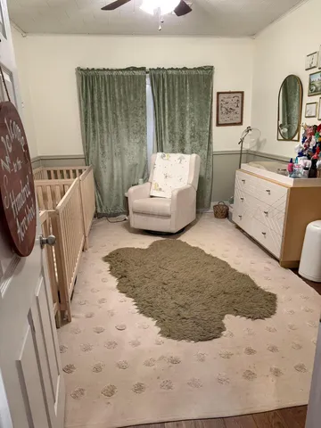 a bedroom with furniture and a bed