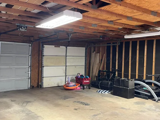 a view of a garage with storage