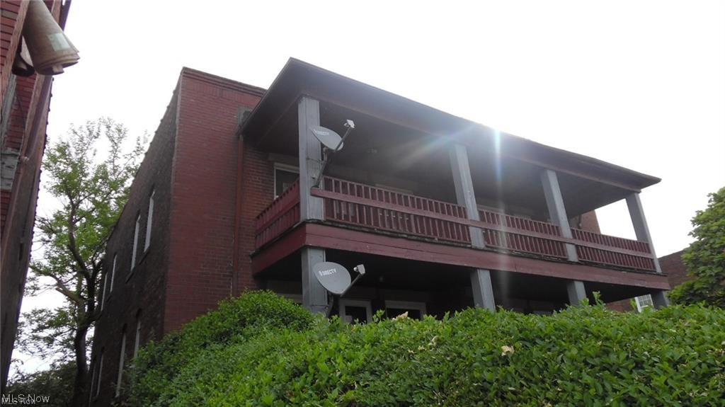 1815-1817 Lakeview Road Cleveland, OH 44112 - Photo 1 of 1 Rear view of house with balcony