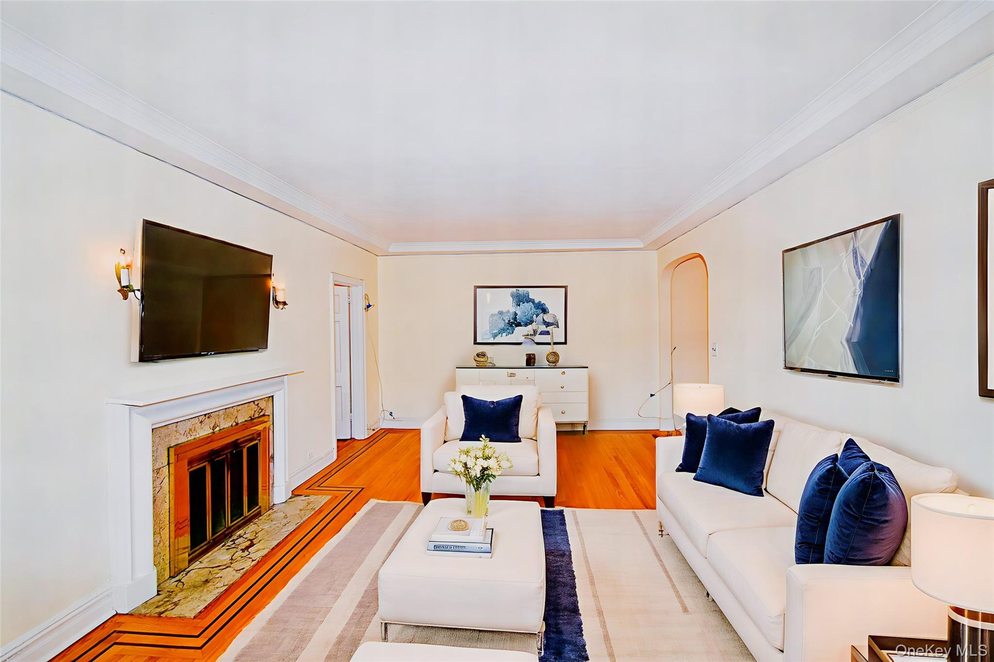 4 Park Lane, Unit 4B Mount Vernon, NY 10552 - Photo 6 of 19 a living room with furniture fireplace and flat screen tv