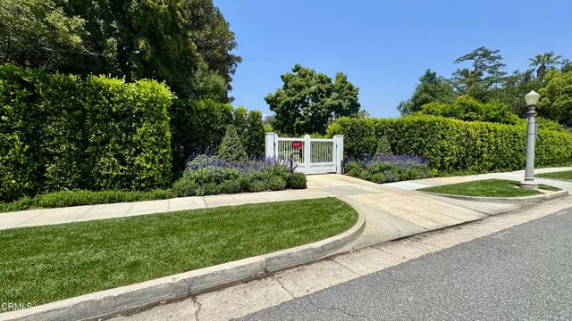 a view of a backyard with a garden