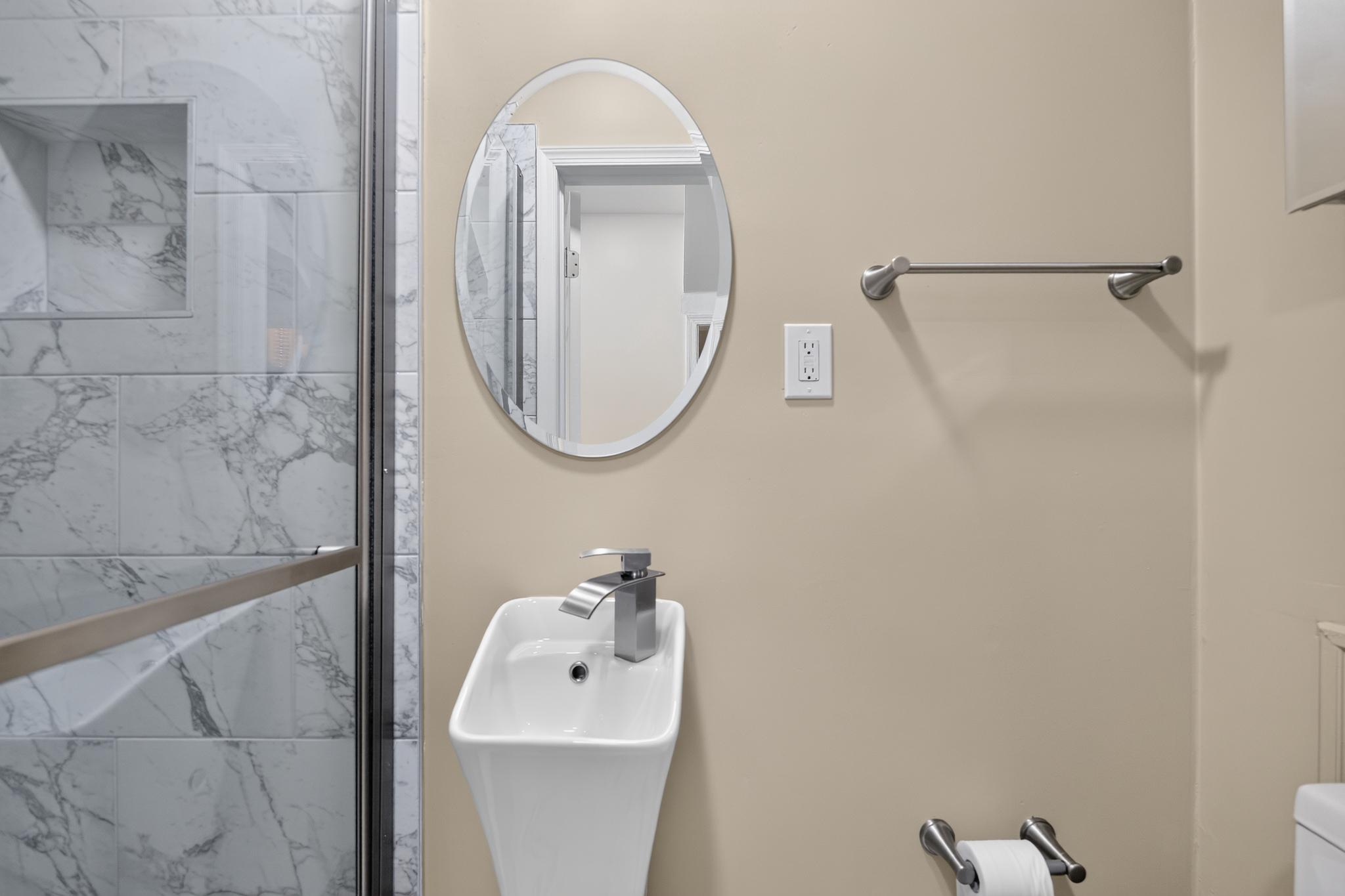 8625 Indian Springs Road Laurel, MD 20724 - Photo 16 of 16 Sleek bathroom with modern finishes on first level