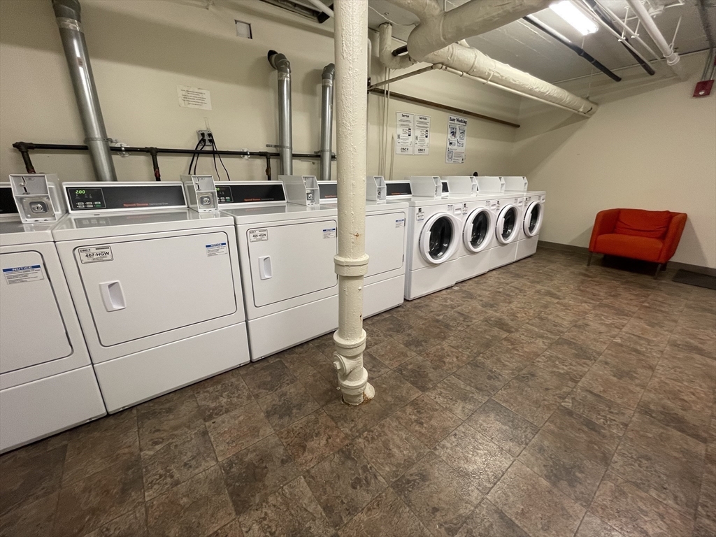 660 Huntington Avenue, Unit 58 Boston, MA 02115 - Photo 13 of 19 a utility room with dryer and washer