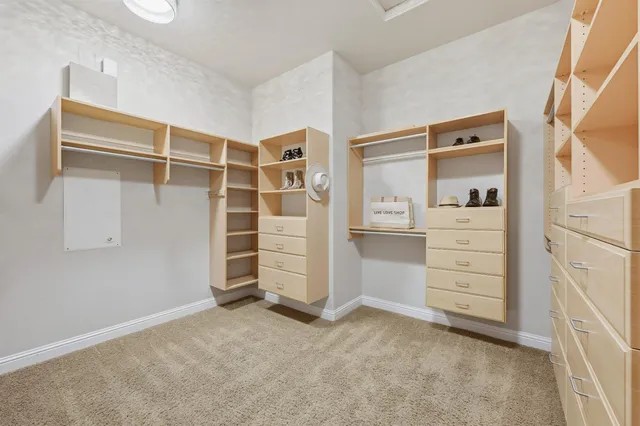 a view of an empty walk in closet