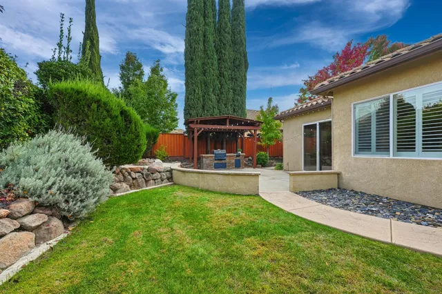a view of a house with roof deck