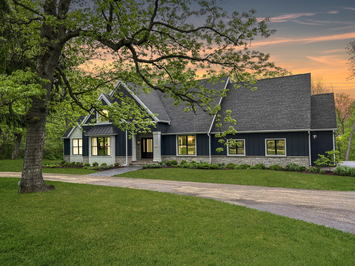 2974 West Forest Road Freeport, IL 61032 - Photo 1 of 59 a front view of a house with a garden