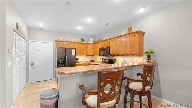 $274,900 | 166 Oak Harbor Drive, Unit 2B, Camdenton, MO 65020