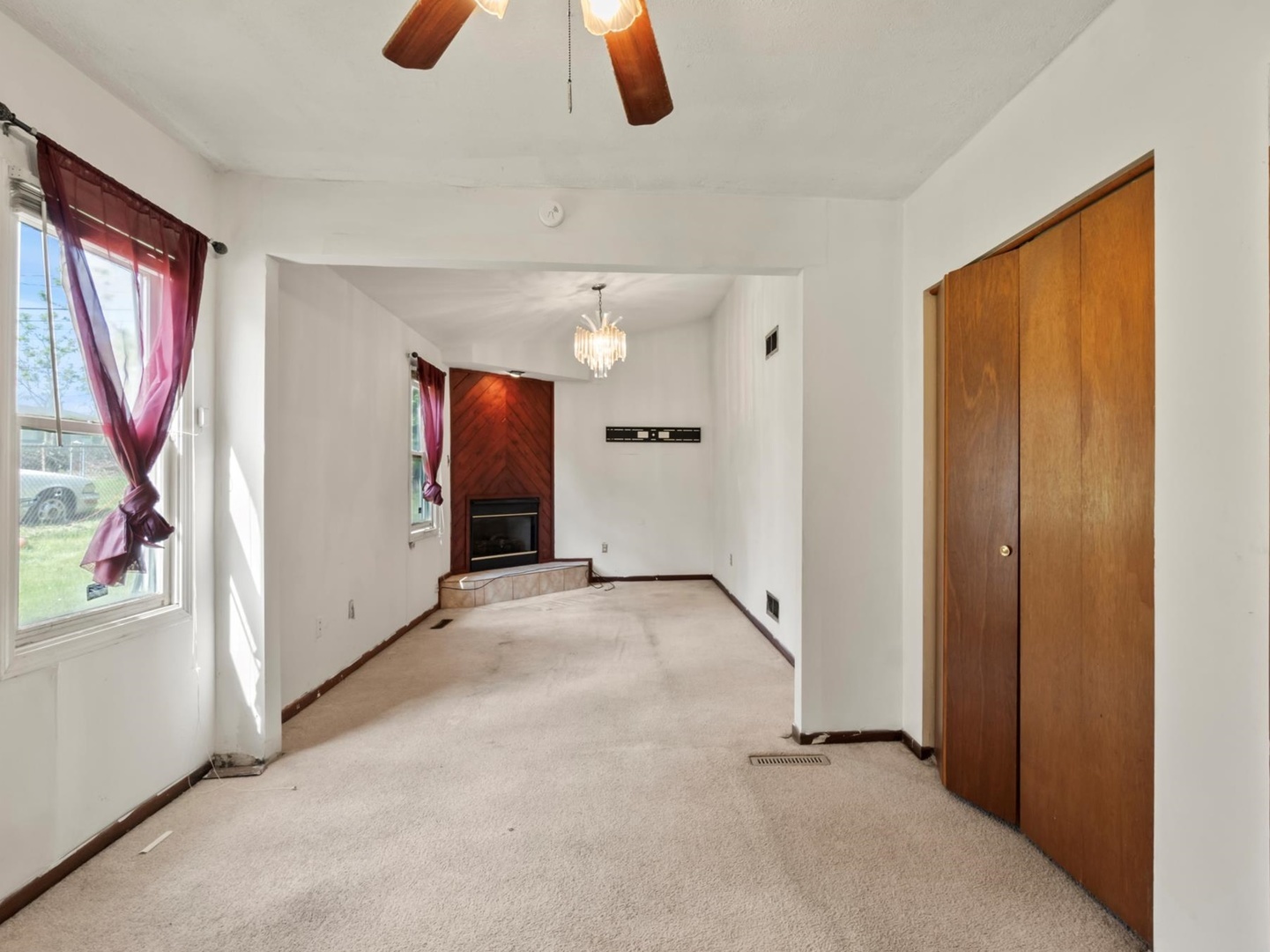 1317 Fairview Avenue Joliet, IL 60432 - Photo 12 of 19 wooden floor in an empty room with a window