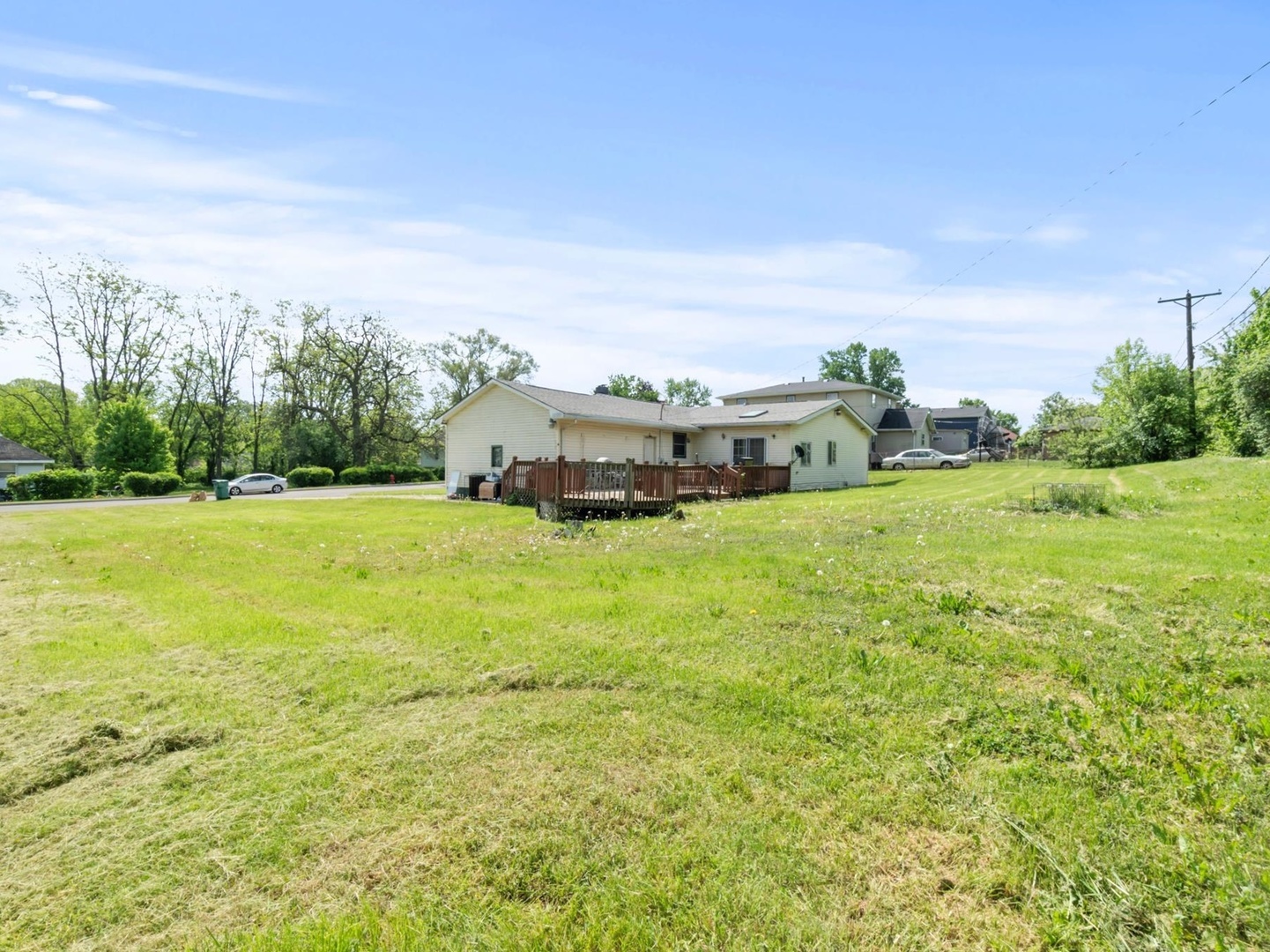 1317 Fairview Avenue Joliet, IL 60432 - Photo 18 of 19 a view of a field with an trees in the background