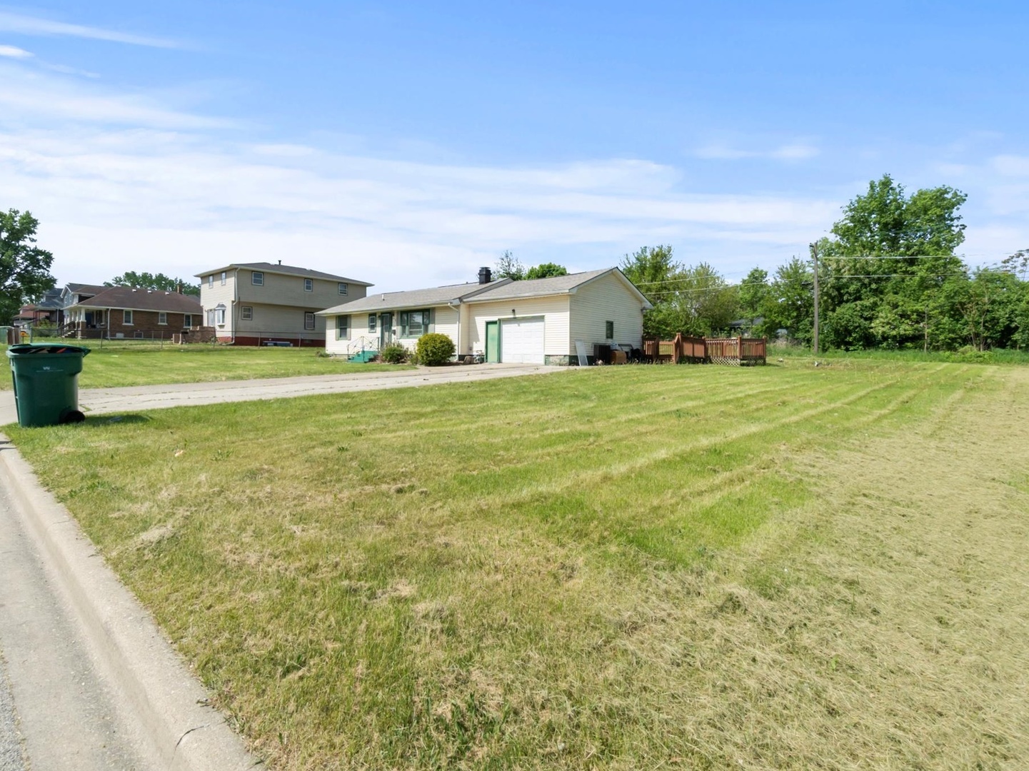 1317 Fairview Avenue Joliet, IL 60432 - Photo 19 of 19 a front view of a house with a big yard