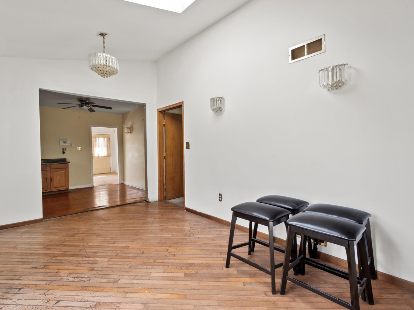 1317 Fairview Avenue Joliet, IL 60432 - Photo 6 of 19 a view of a livingroom with furniture and wooden floor