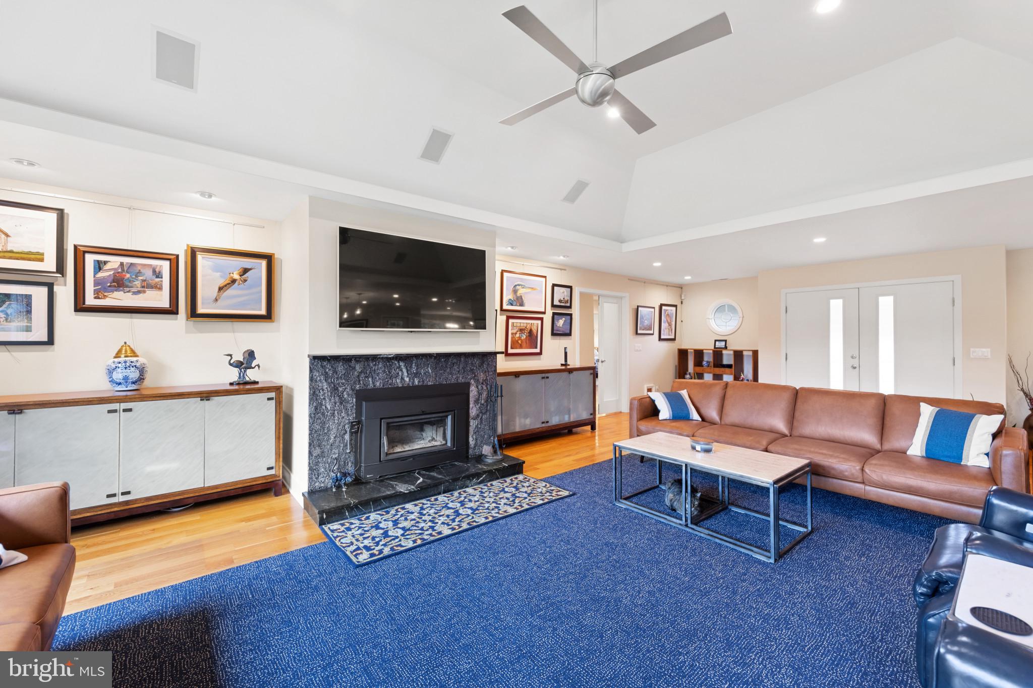 8645 Northbend Circle Easton, MD 21601 - Photo 19 of 70 Great room wood burning fireplace with insert
