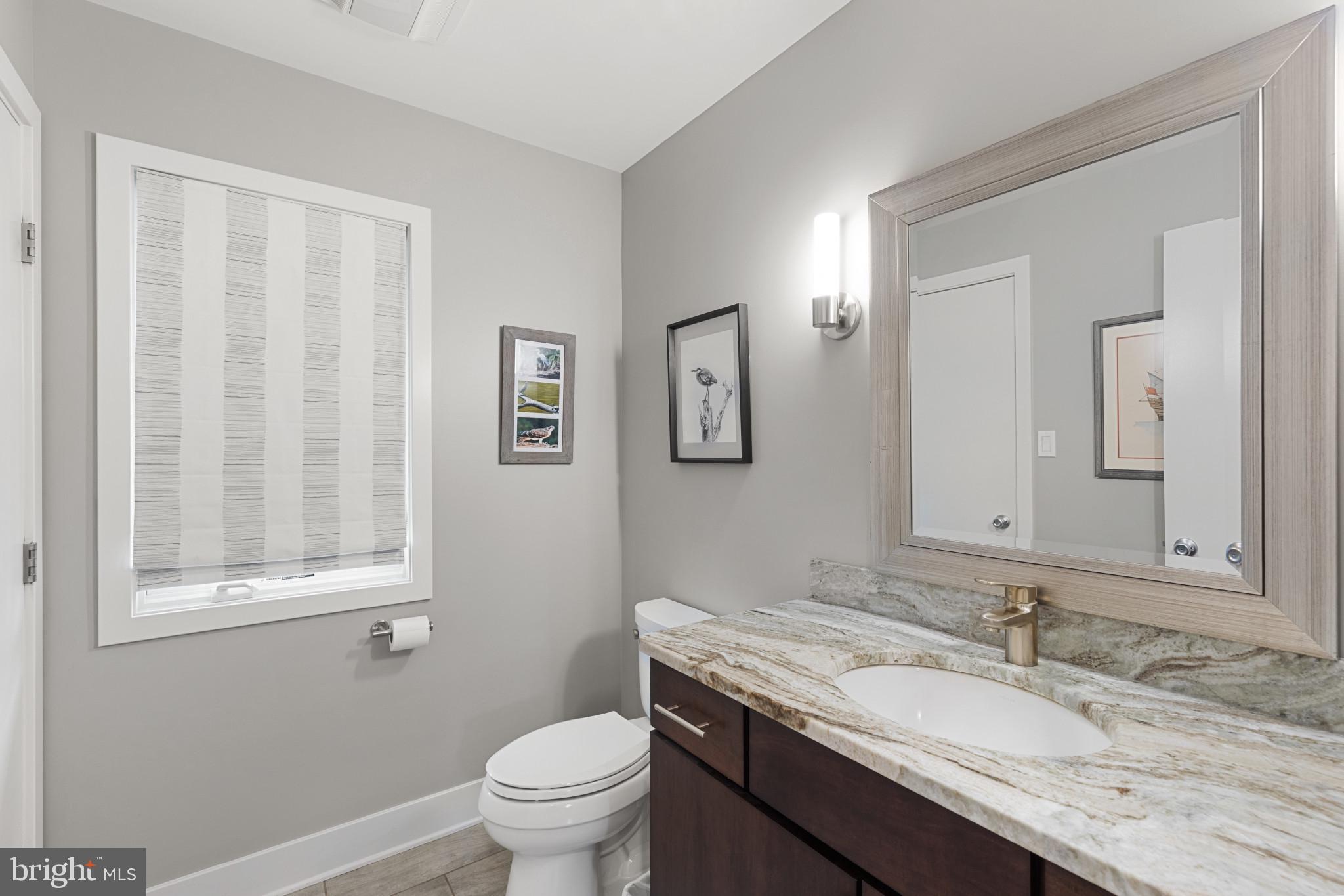 8645 Northbend Circle Easton, MD 21601 - Photo 47 of 70 Powder room off kitchen