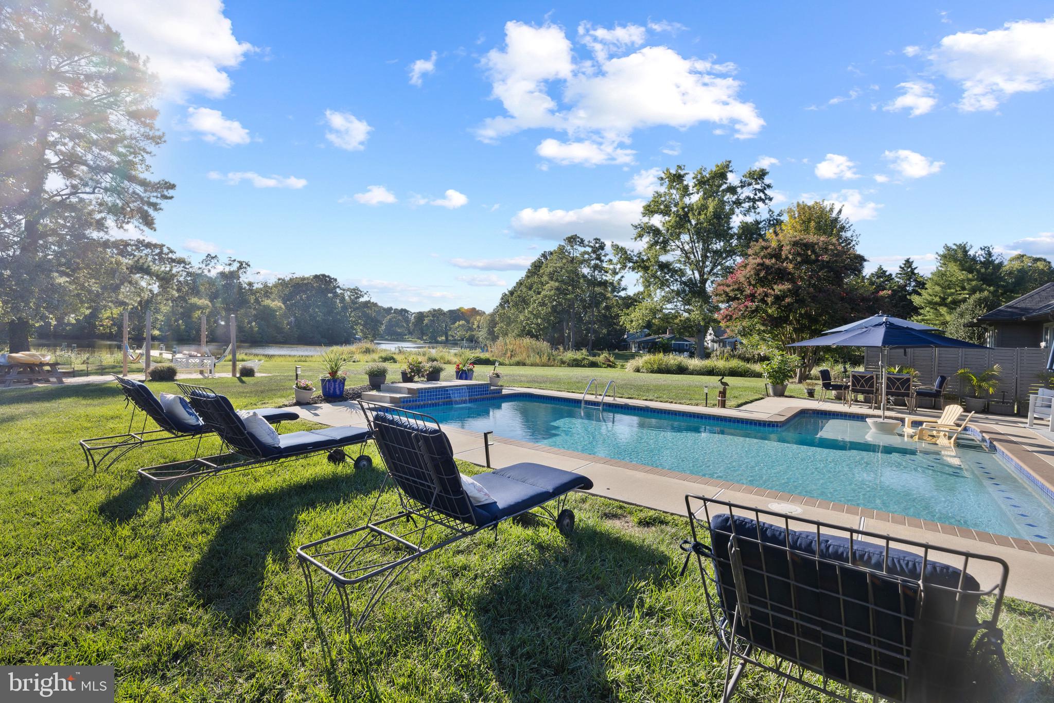 8645 Northbend Circle Easton, MD 21601 - Photo 48 of 70 What a pool! Sylvan built gunite with waterfall