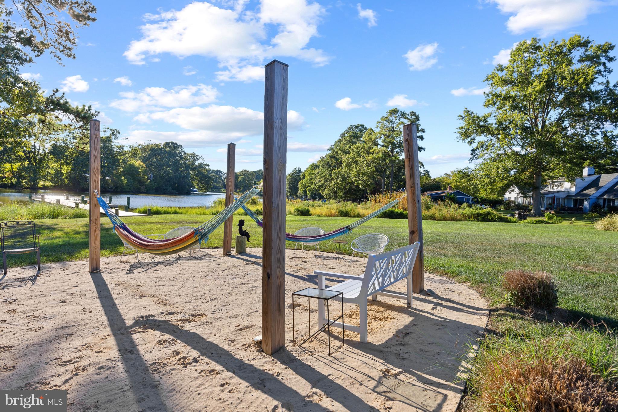 8645 Northbend Circle Easton, MD 21601 - Photo 53 of 70 Waterfront sandpit with hammocks