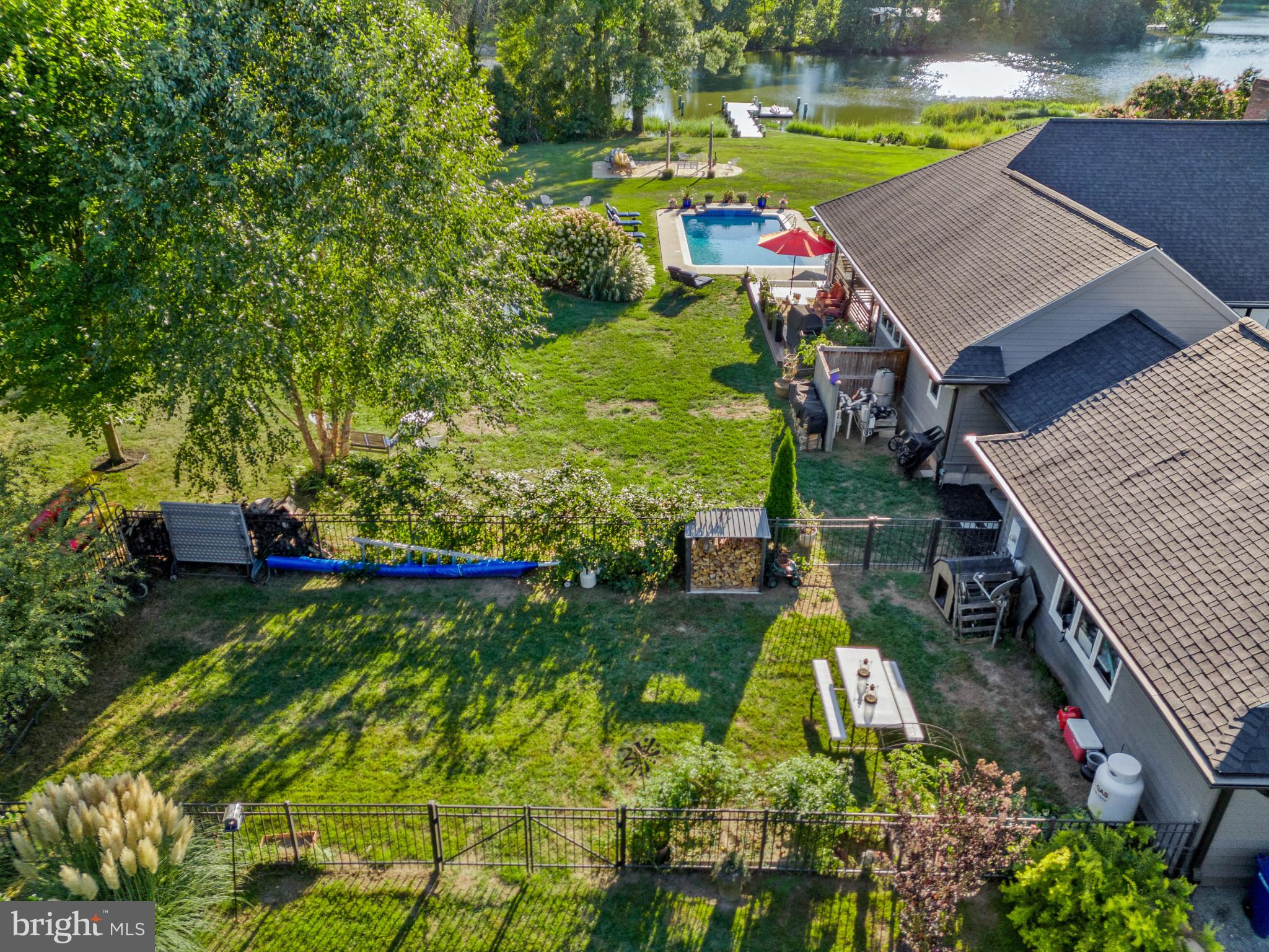 8645 Northbend Circle Easton, MD 21601 - Photo 59 of 70 Private side yard with dog run, gardens