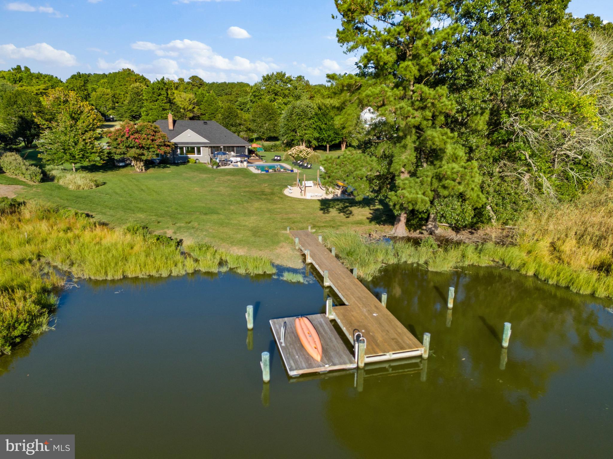 8645 Northbend Circle Easton, MD 21601 - Photo 63 of 70 Pier with floating kayak dock