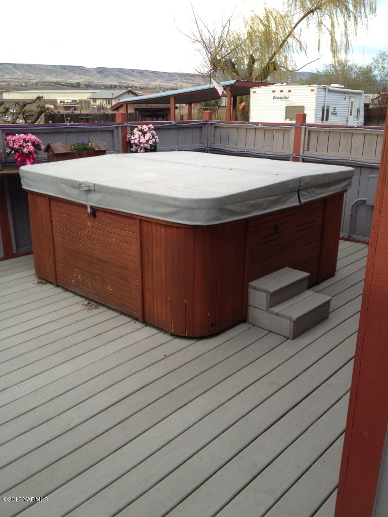 2805 La Framboise Road Moxee, WA 98936 - Photo 12 of 21 a view of a terrace with wooden floor and barbeque oven