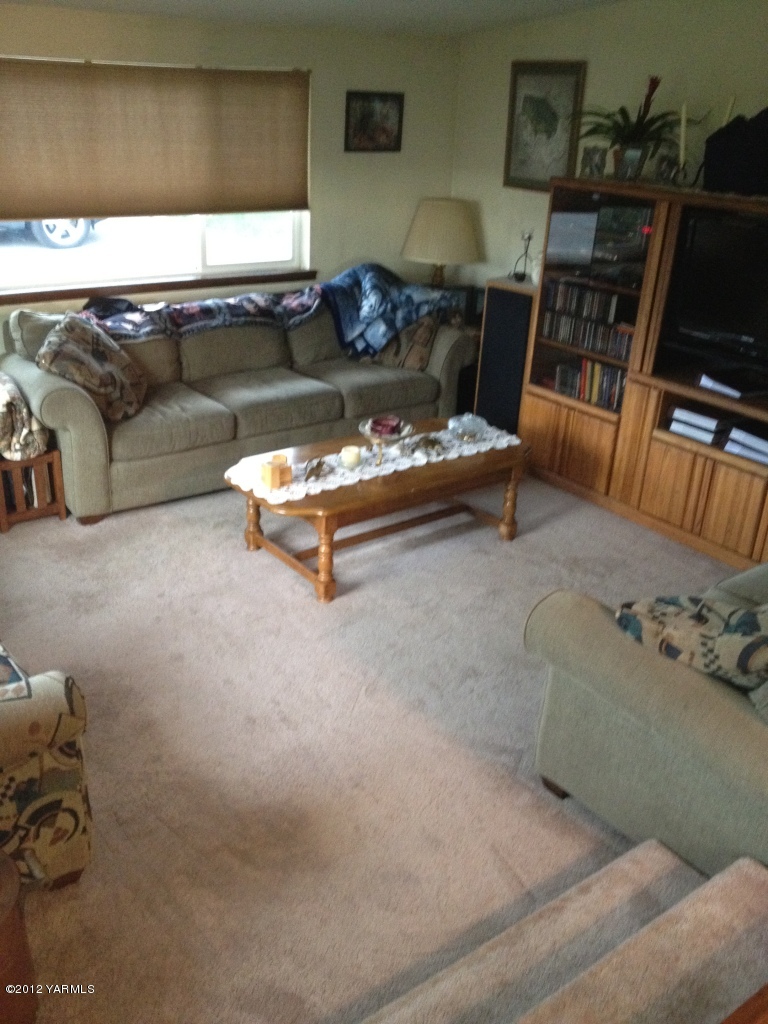 2805 La Framboise Road Moxee, WA 98936 - Photo 16 of 21 a living room with furniture and a flat screen tv