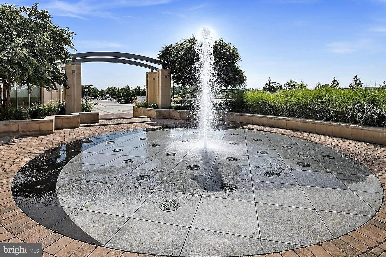 3600 South Glebe Road, Unit 602W Arlington, VA 22202 - Photo 11 of 46 a view of a terrace with a fire pit and trees