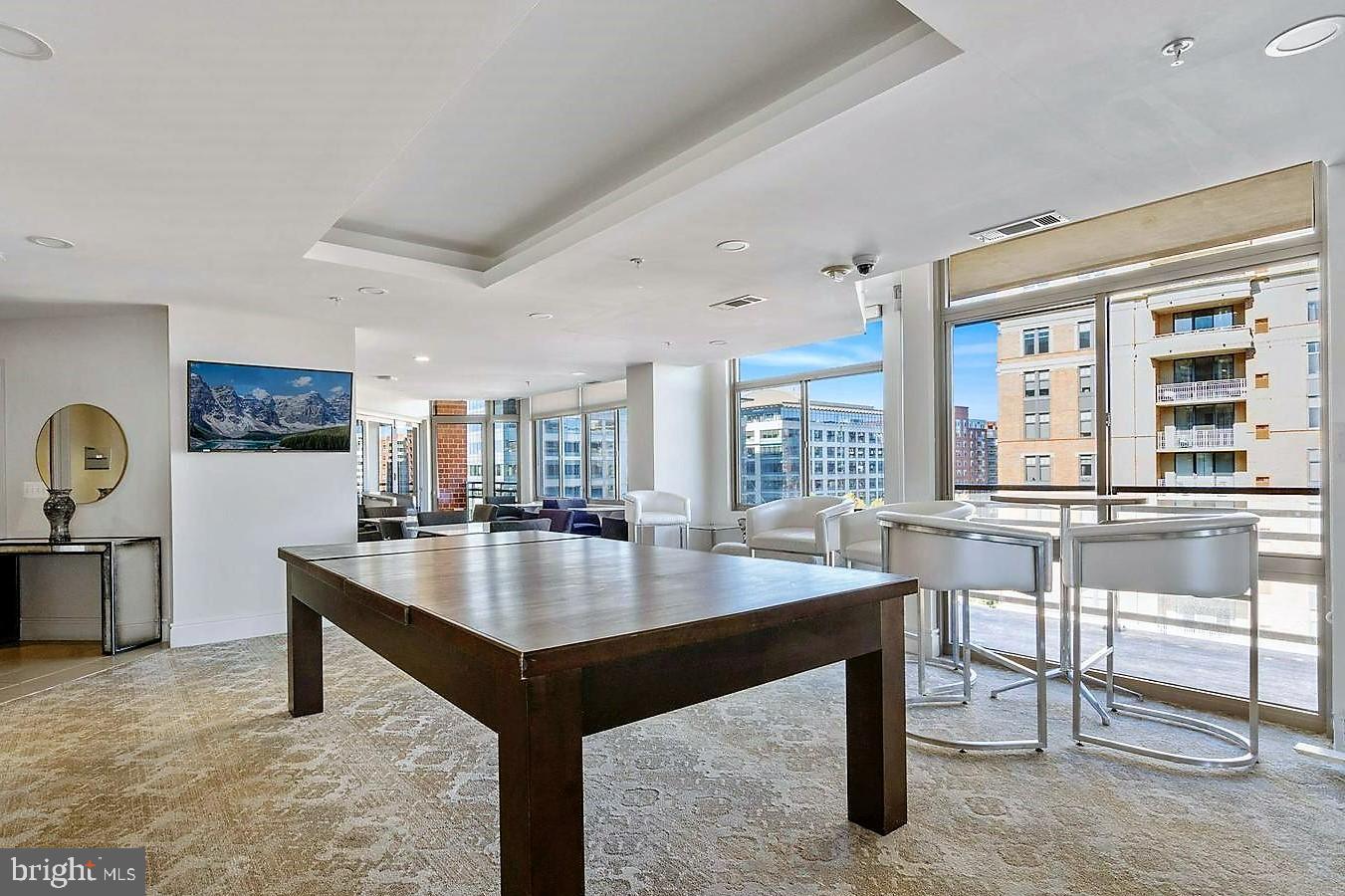 3600 South Glebe Road, Unit 602W Arlington, VA 22202 - Photo 44 of 46 a view of kitchen and dining area with chandelier
