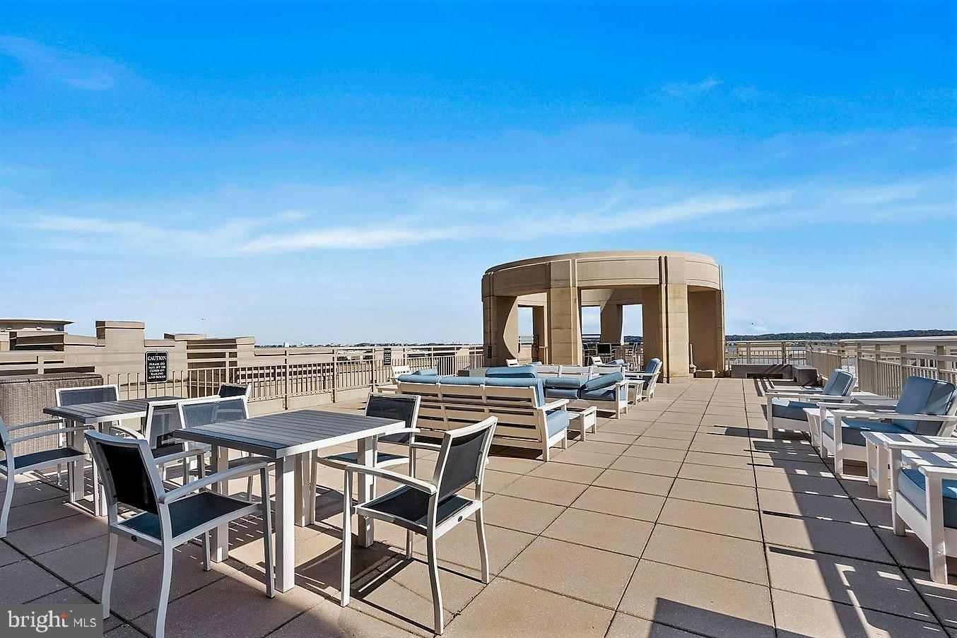 3600 South Glebe Road, Unit 602W Arlington, VA 22202 - Photo 45 of 46 a view of a terrace with furniture and stove