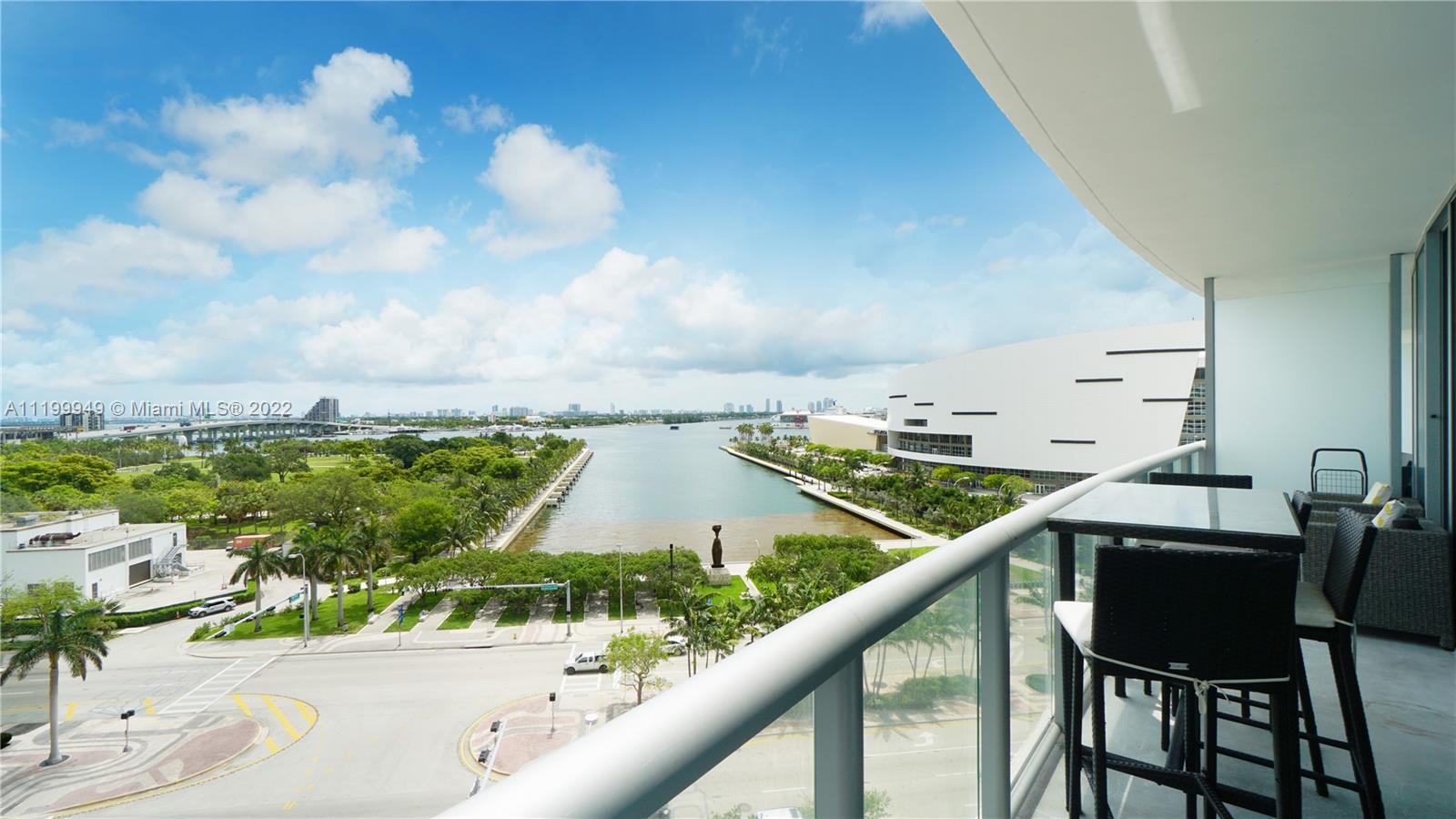 888 Biscayne Boulevard, Unit 811 Miami, FL 33132 - Photo 12 of 20 a view of a balcony with chairs