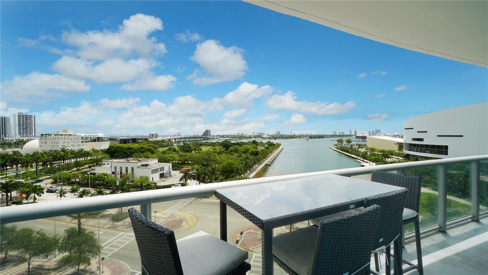 888 Biscayne Boulevard, Unit 811 Miami, FL 33132 - Photo 15 of 20 a view of a balcony with furniture