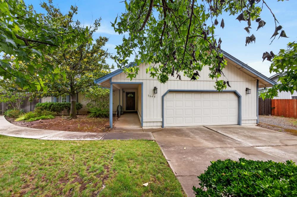 7649 El Modena Avenue Elverta, CA 95626 - Photo 1 of 75 a front view of a house with a yard and garage