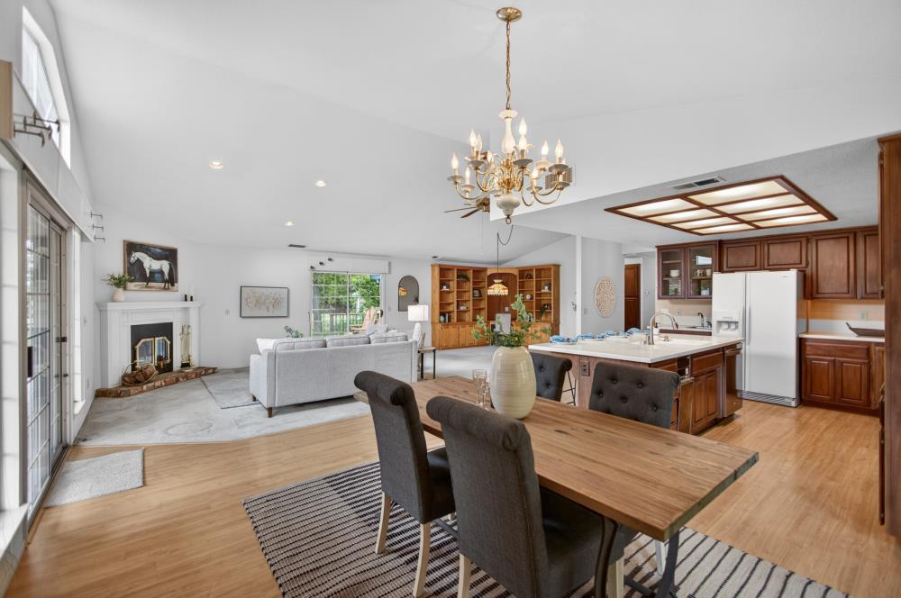 7649 El Modena Avenue Elverta, CA 95626 - Photo 22 of 75 a view of a dining room with furniture window and wooden floor