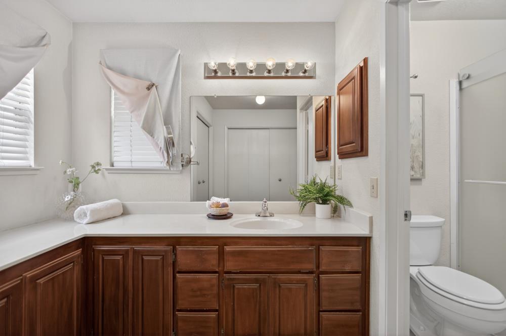 7649 El Modena Avenue Elverta, CA 95626 - Photo 42 of 75 a bathroom with a sink and a mirror