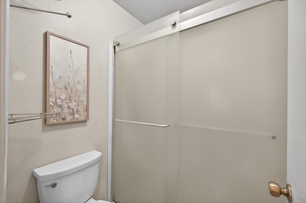 7649 El Modena Avenue Elverta, CA 95626 - Photo 44 of 75 a white toilet sitting next to a shower