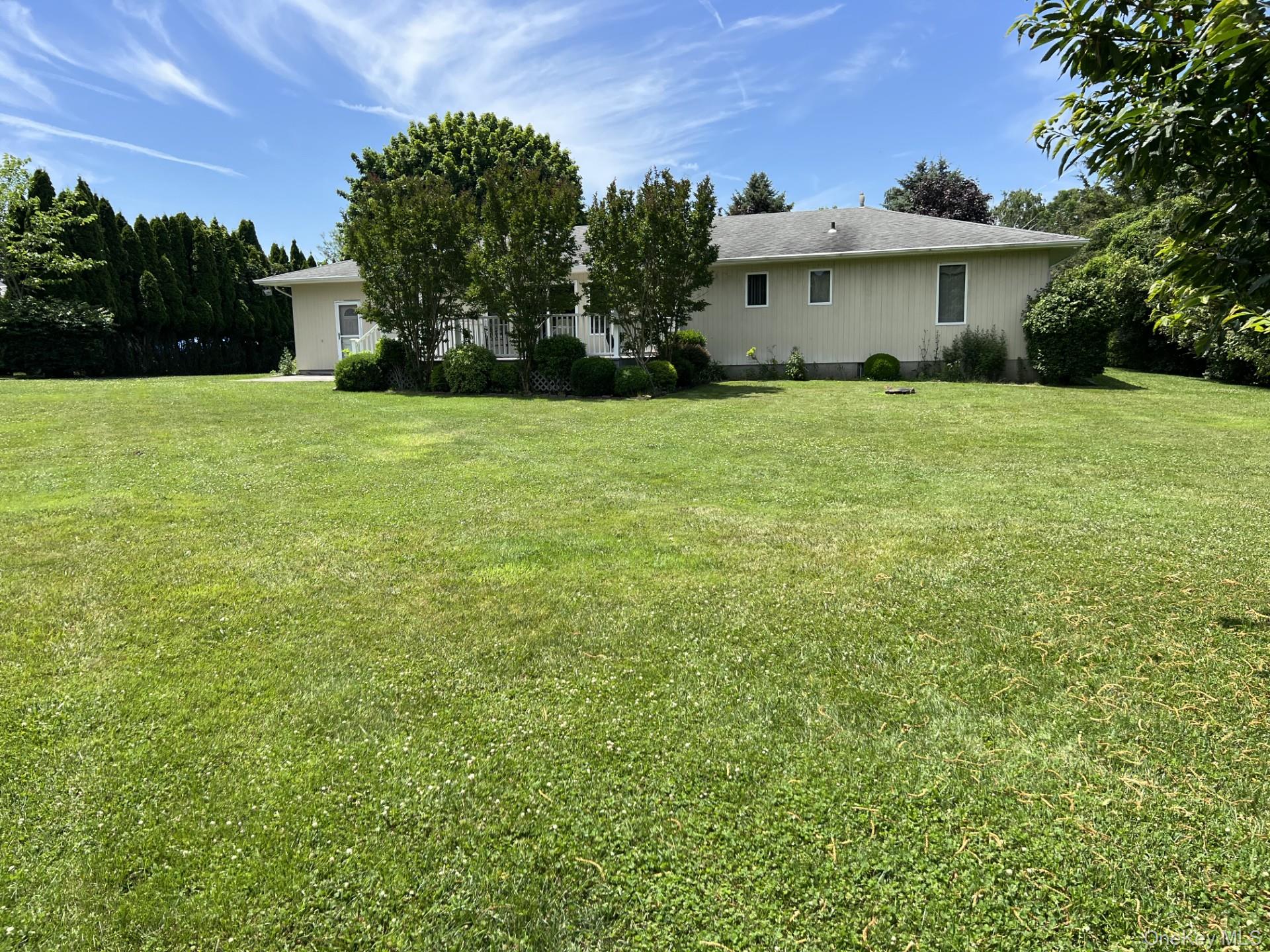 215 Leon Road Southold, NY 11971 - Photo 3 of 17 large backyard ready for fun and games