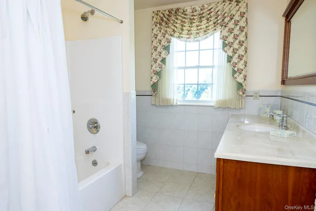 a bathroom with a sink and a tub