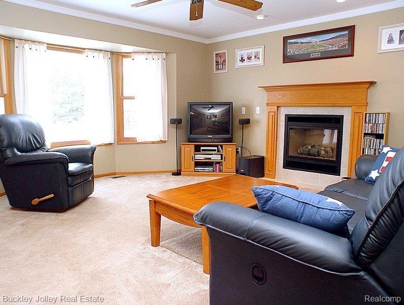 8369 Lee Road Brighton, MI 48116 - Photo 8 of 13 Family Room with Fireplace