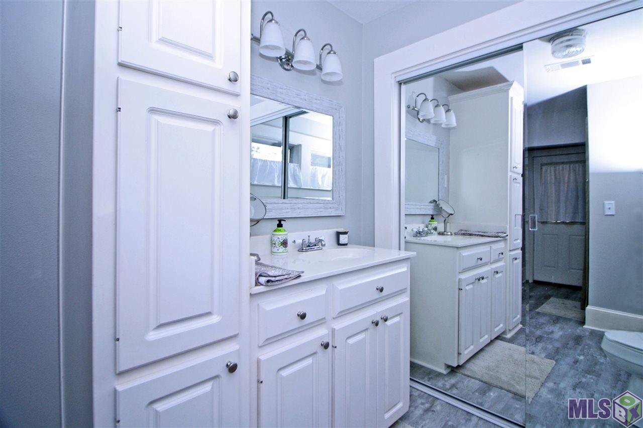 7454 South River Road Addis, LA 70710 - Photo 14 of 29 Bathroom 3 Extra Closet behind mirrors