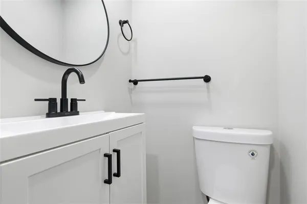 a bathroom with a sink and mirror