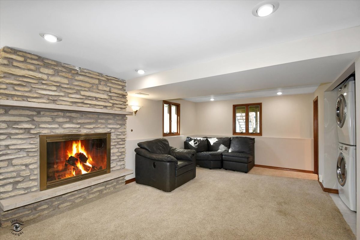 713 Southgate Road New Lenox, IL 60451 - Photo 17 of 25 a living room with furniture and a fireplace