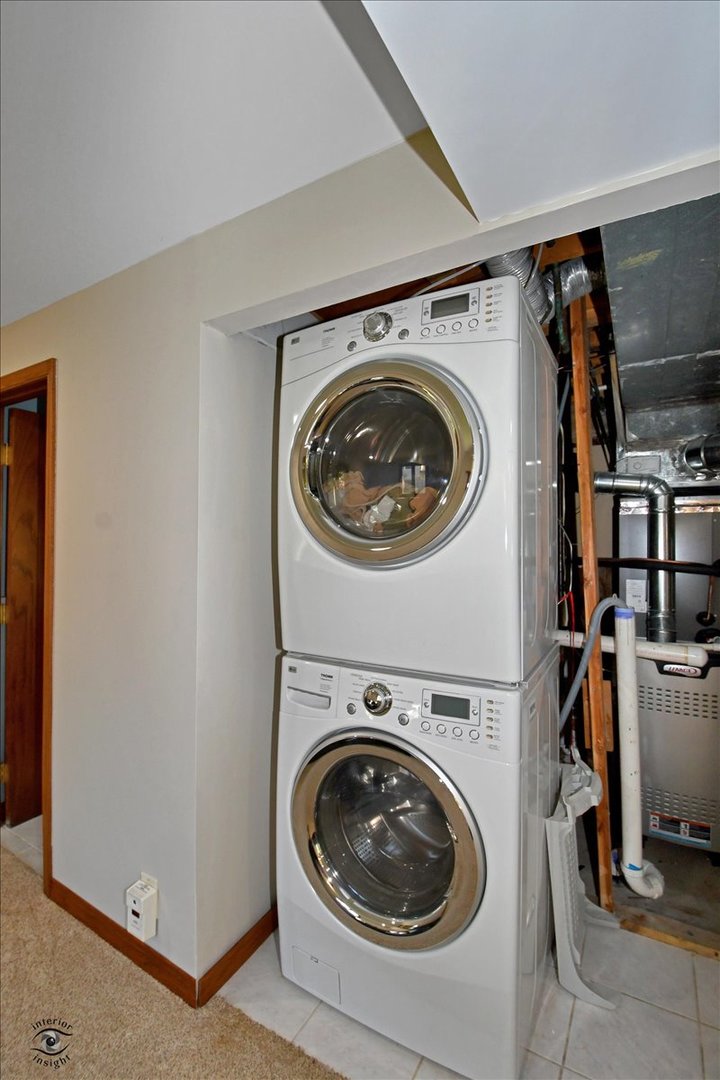 713 Southgate Road New Lenox, IL 60451 - Photo 20 of 25 a utility room with dryer and washer