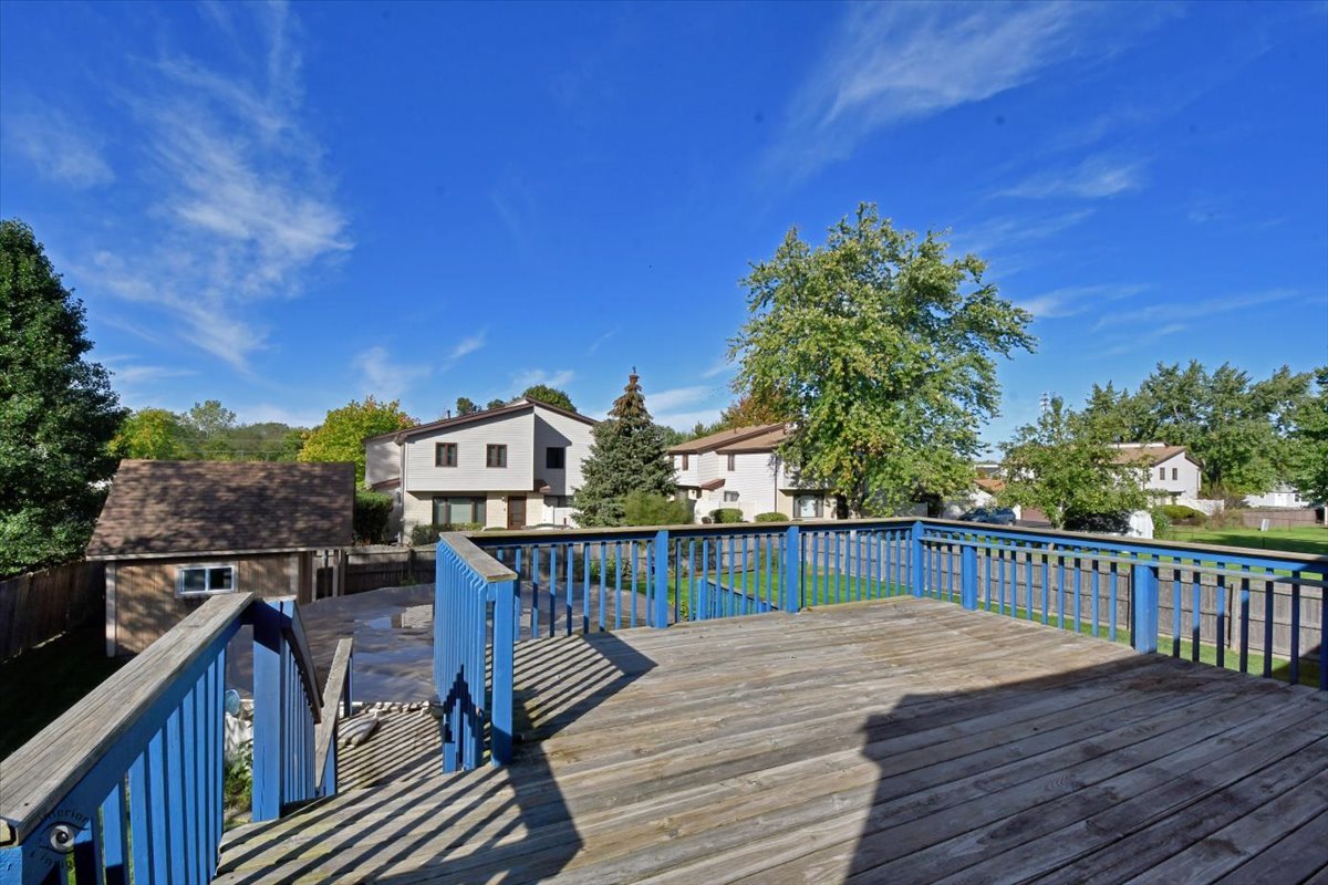 713 Southgate Road New Lenox, IL 60451 - Photo 22 of 25 a terrace with wooden fence