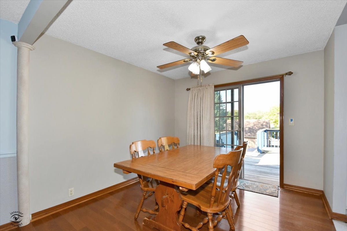 713 Southgate Road New Lenox, IL 60451 - Photo 8 of 25 a view of a dining room with furniture window and wooden floor
