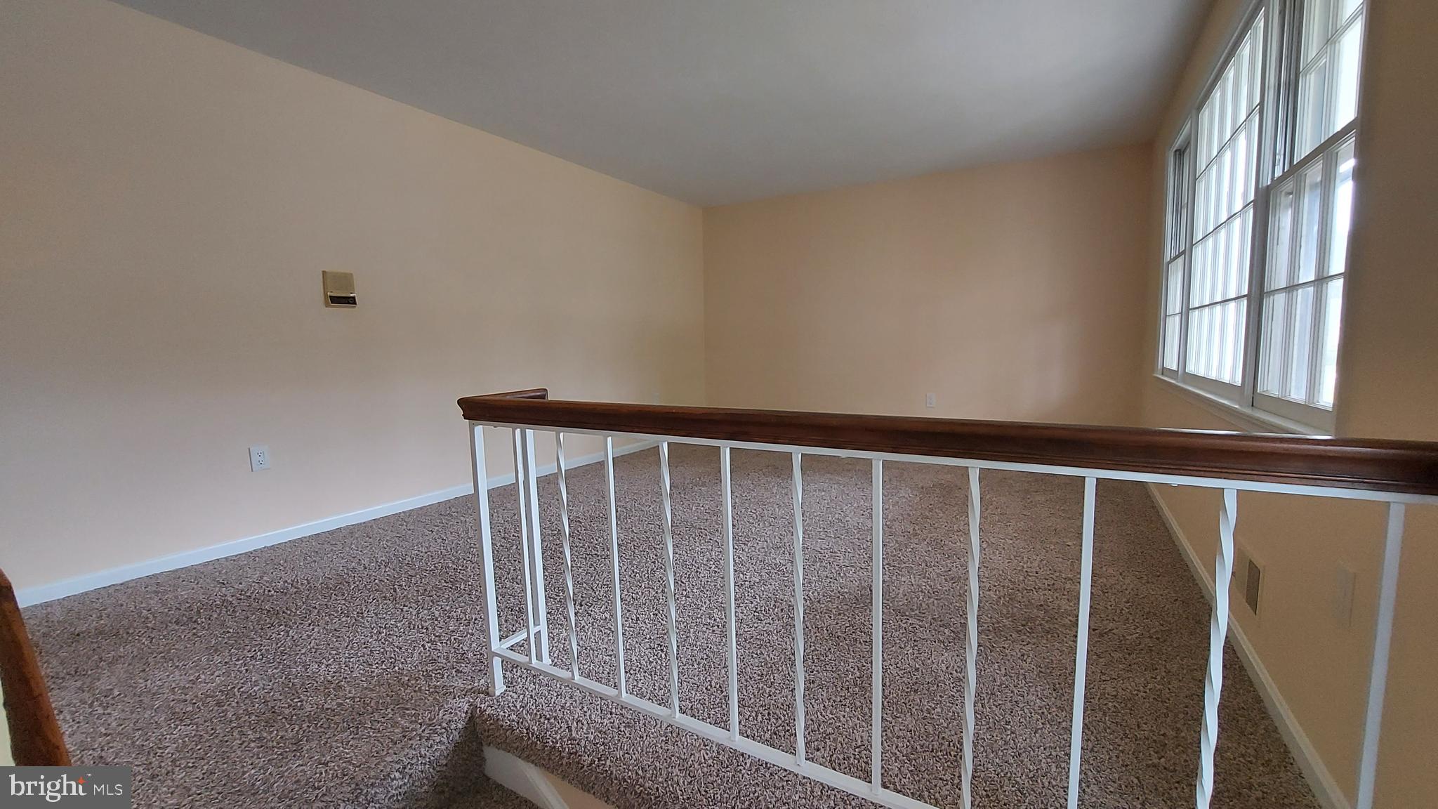 37730 Apache Road Charlotte Hall, MD 20622 - Photo 15 of 21 a view of staircase with wooden floor