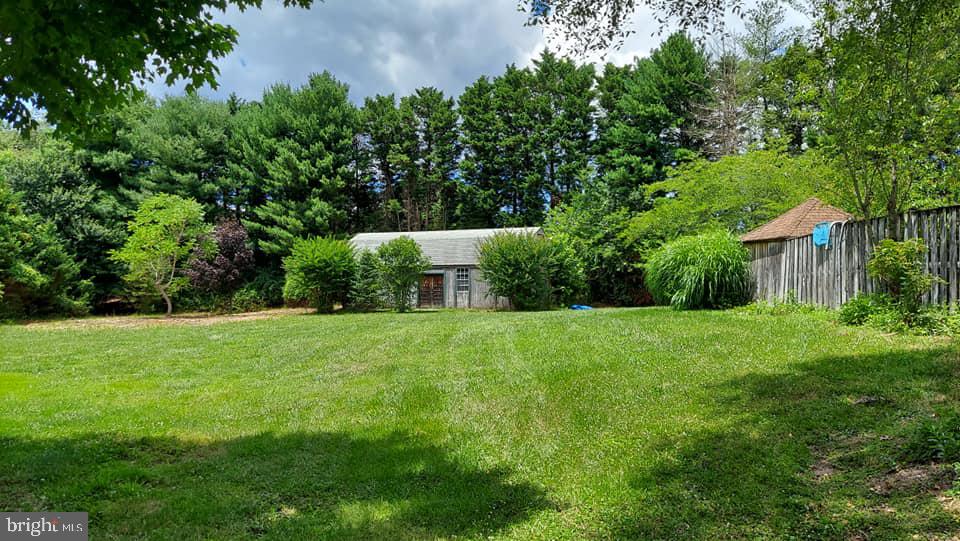 37730 Apache Road Charlotte Hall, MD 20622 - Photo 3 of 21 a view of a backyard with a garden