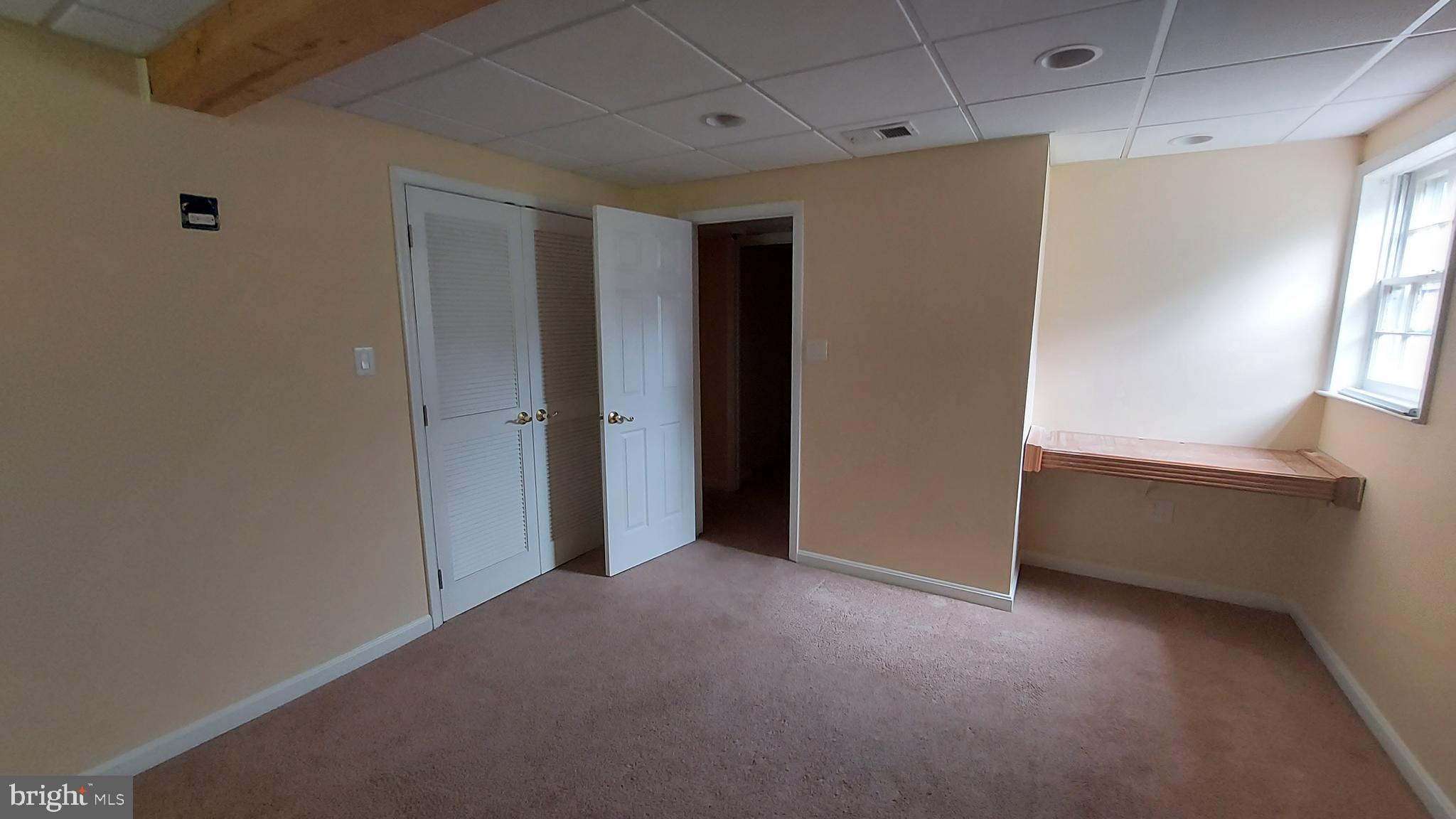 37730 Apache Road Charlotte Hall, MD 20622 - Photo 21 of 21 a view of an empty room with a window
